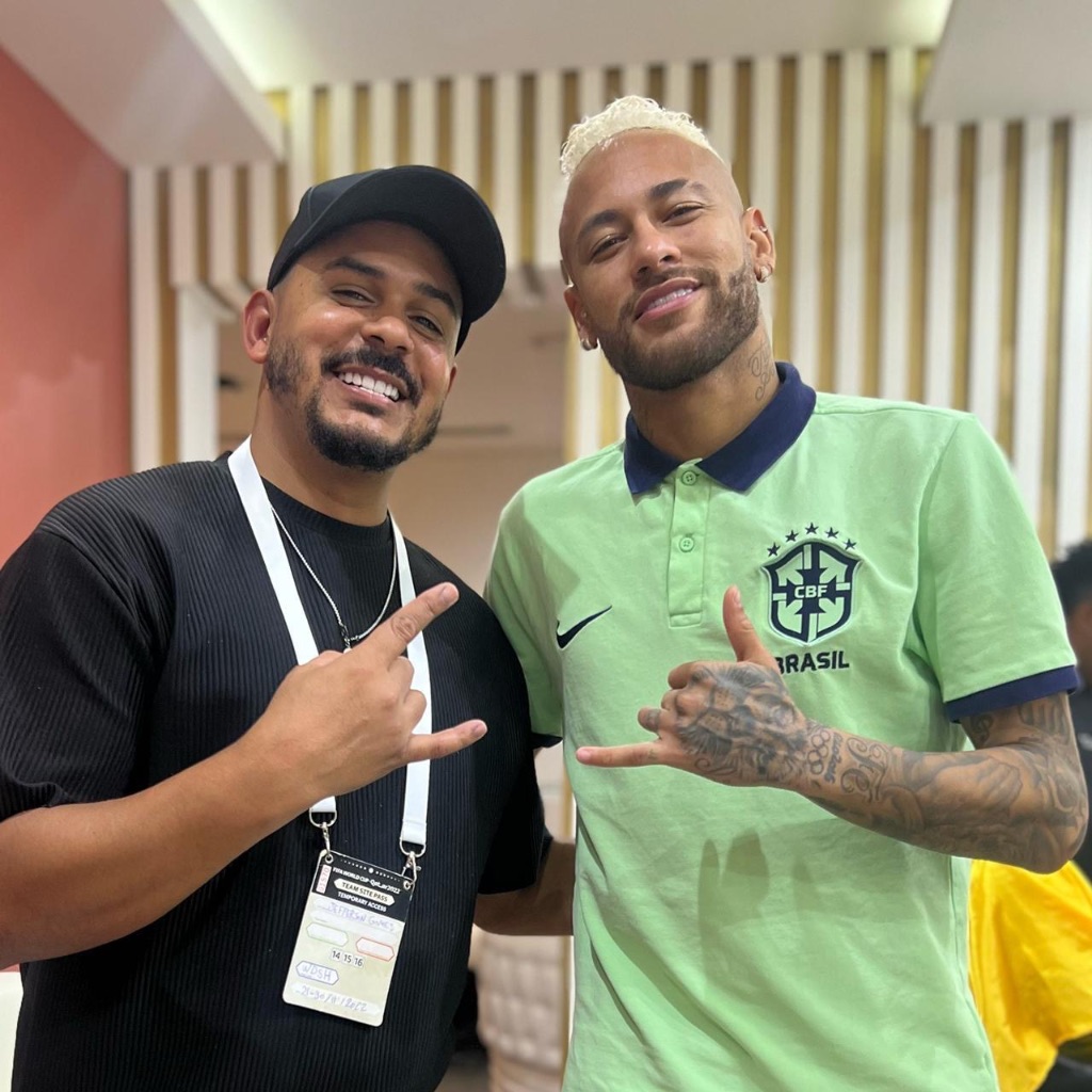 Don Marlus com jogador da Seleção Brasileira — Qatar 2022