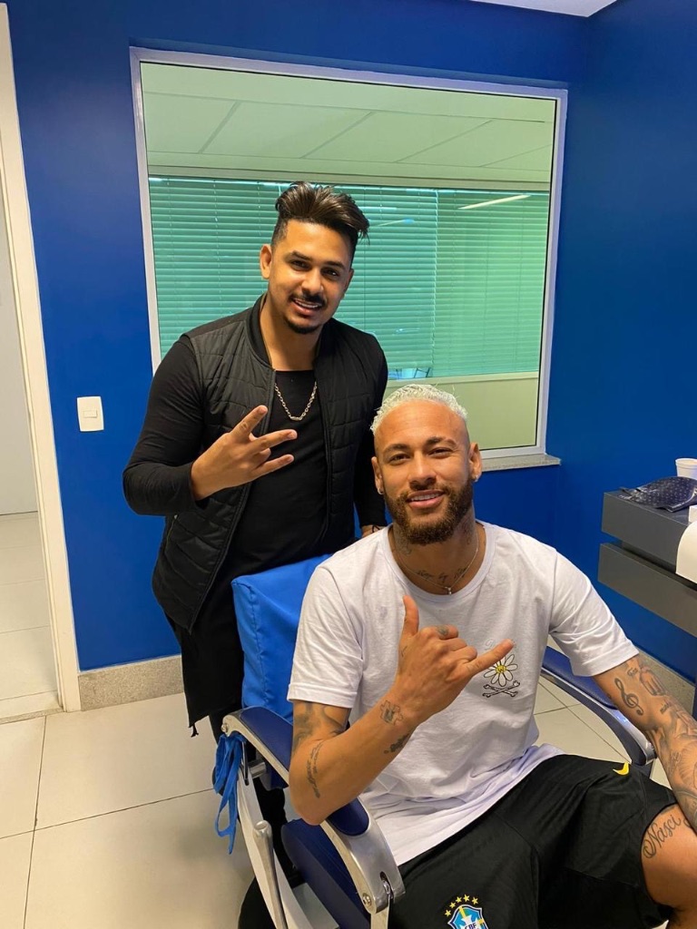 Don Marlus com jogador da Seleção Brasileira